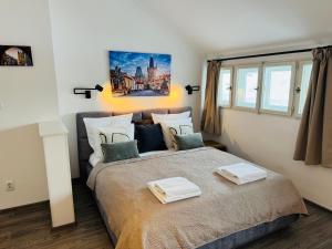 Posteľ alebo postele v izbe v ubytovaní Beautiful Apartment Dlouhá