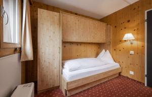 Postel nebo postele na pokoji v ubytování Hotel Restaurant Bänklialp