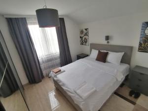 Postelja oz. postelje v sobi nastanitve Apartman Ika 9N