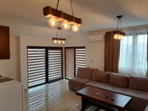 Predel za sedenje v nastanitvi Apartman Ika 9N