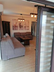 Predel za sedenje v nastanitvi Apartman Ika 9N