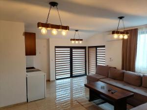 Predel za sedenje v nastanitvi Apartman Ika 9N