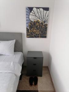 Postelja oz. postelje v sobi nastanitve Apartman Ika 9N