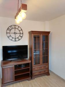 TV in/ali zabaviščno središče v nastanitvi Apartman Ika 9N