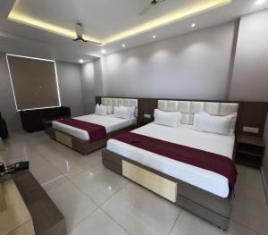 Hotel Annpurna Regency客房内的一张或多张床位