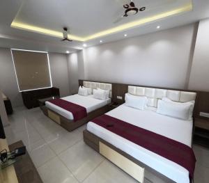 Hotel Annpurna Regency客房内的一张或多张床位