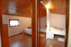 Llit o llits en una habitació de Parenzana Haven Hideaway STAR