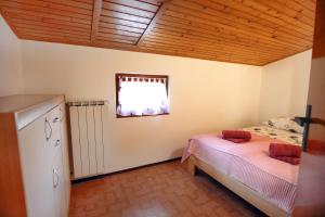 Llit o llits en una habitació de Parenzana Haven Hideaway STAR