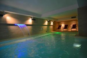 Bazén v ubytování Te Stela Resort & SPA nebo v jeho okolí