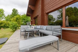 Balkón nebo terasa v ubytování Ferienhaus Holzperle am Meer
