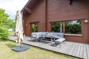 Zahrada ubytování Ferienhaus Holzperle am Meer + 37 fotografií