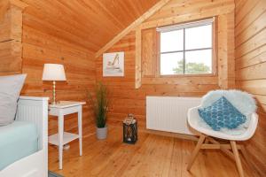 Posezení v ubytování Ferienhaus Holzperle am Meer