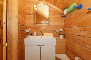 Koupelna v ubytování Ferienhaus Holzperle am Meer