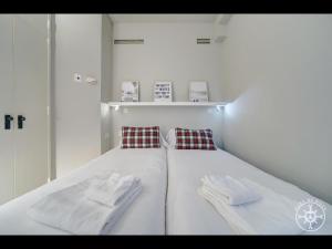 מיטה או מיטות בחדר ב-CONILH de Alma de Nieve