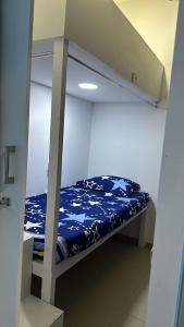 Ένα ή περισσότερα κρεβάτια σε δωμάτιο στο Deluxe Loft Rooms near Burjuman Metro Station , Bur Dubai
