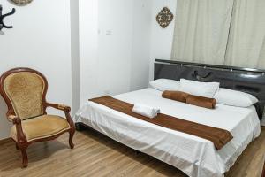Voodi või voodid majutusasutuse Hotel Maranta toas