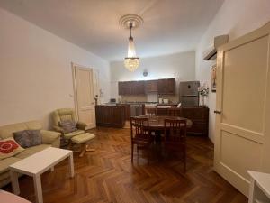 a living room with a couch and a table at Apartment Croatia in Zagreb