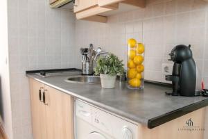 Kuchnia lub aneks kuchenny w obiekcie Living4malaga Spring Boutique