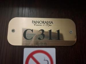 a sign that says pamognoniaeriaeria genuinexualilimum at Apartment Wintermärchen Bansko 4* in Bansko