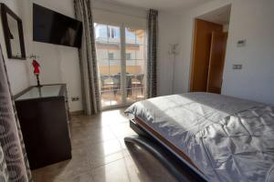 Postel nebo postele na pokoji v ubytování Carrer Pagell