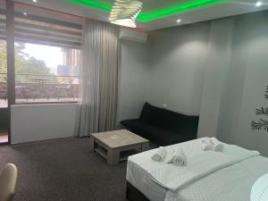 KENT hotel & Restaurant KENT beach客房内的一张或多张床位