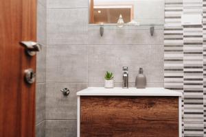 Kúpeľňa v ubytovaní Oliver Apartman