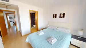 Ein Bett oder Betten in einem Zimmer der Unterkunft Casa Espliego V-A Murcia Holiday Rentals Property