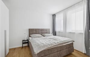 Säng eller sängar i ett rum på Gebirgsresort Winterberg