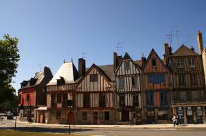 a group of old buildings on the side of a street at Delalauret Apartment - Vannes Centre in Vannes