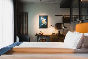 Postel nebo postele na pokoji v ubytování Exeter Hotel