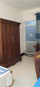 Ένα ή περισσότερα κρεβάτια σε δωμάτιο στο top sea view guest