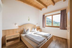 Posteľ alebo postele v izbe v ubytovaní Residence Reisenschuh