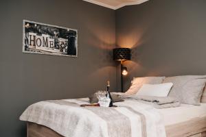 Posteľ alebo postele v izbe v ubytovaní Oliver Apartman