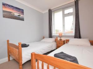 Katil atau katil-katil dalam bilik di 3 bed in Westward Ho HOLMS
