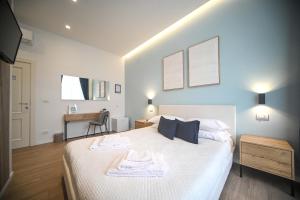 Postel nebo postele na pokoji v ubytování Almarea B&B Trani