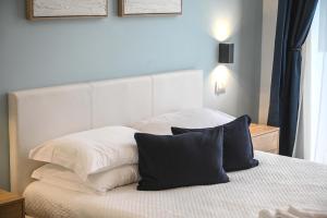 Postel nebo postele na pokoji v ubytování Almarea B&B Trani