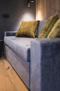Posezení v ubytování DOLOMITI EXCLUSIVE YOUR MOUNTAIN SUITE