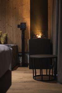 Posezení v ubytování DOLOMITI EXCLUSIVE YOUR MOUNTAIN SUITE