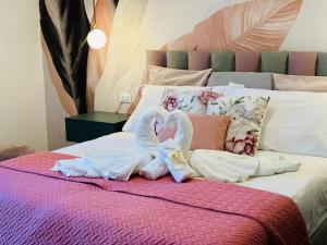 Letto o letti in una camera di Sant'Orsola Lodge Bologna