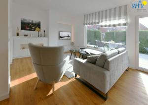 Χώρος καθιστικού στο Bungalow Hasela mit Workation