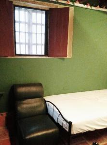 Postel nebo postele na pokoji v ubytování Artistic Nest