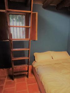Postel nebo postele na pokoji v ubytování Artistic Nest