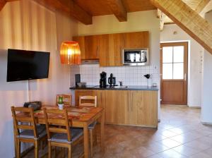 Kuchyň nebo kuchyňský kout v ubytování Hof am Meer "Seerose"