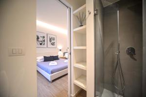 Postel nebo postele na pokoji v ubytování Almarea B&B Trani