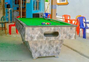 a pool table in a childrens play room at Elios Hotels in Ughelli