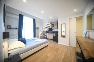 Postel nebo postele na pokoji v ubytování Almarea B&B Trani