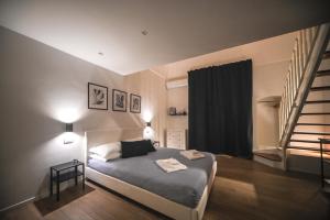 Postel nebo postele na pokoji v ubytování Almarea B&B Trani