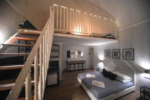 Postel nebo postele na pokoji v ubytování Almarea B&B Trani