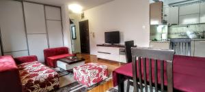 Un televizor și/sau centru de divertisment la Apartment Nate's Place