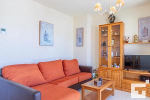Televízia a/alebo spoločenská miestnosť v ubytovaní Apartamento Apolo XVIII 57 - Grupo Turis